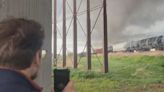 Man takes cover as tornado passed close by