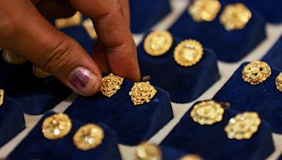 India slashes import tax on gold, silver to tackle smuggling