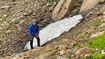 Dwindling snow patches on Scottish hills are 'very visible record' of climate change