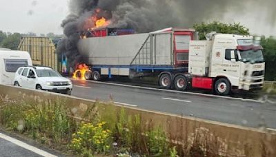 Seven mile tailbacks on the motorway after a fairground ride catches fire | ITV News