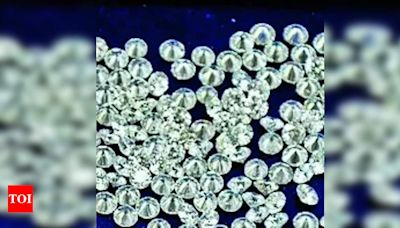 Manager siphons off 100 gems worth 49L | Surat News - Times of India