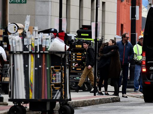 Zombies take to the roof, fans wait below as 'Walking Dead" filming begins downtown