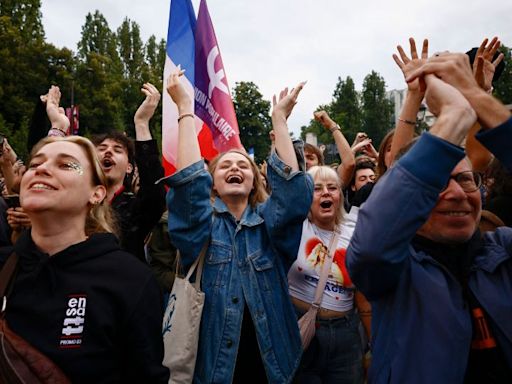 French left-wing coalition projected to beat the far right in surprise second-round result