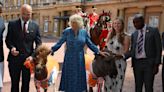 Camilla feeds donkeys and horses while hosting equine charity reception