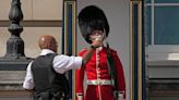 Buckingham Palace Guards Break Stoic Stances to Drink Water amid London Heatwave