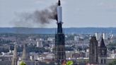 French firefighters rush to put out blaze at Rouen cathedral