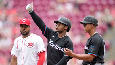 Marlins slip past Reds for 3-2 victory