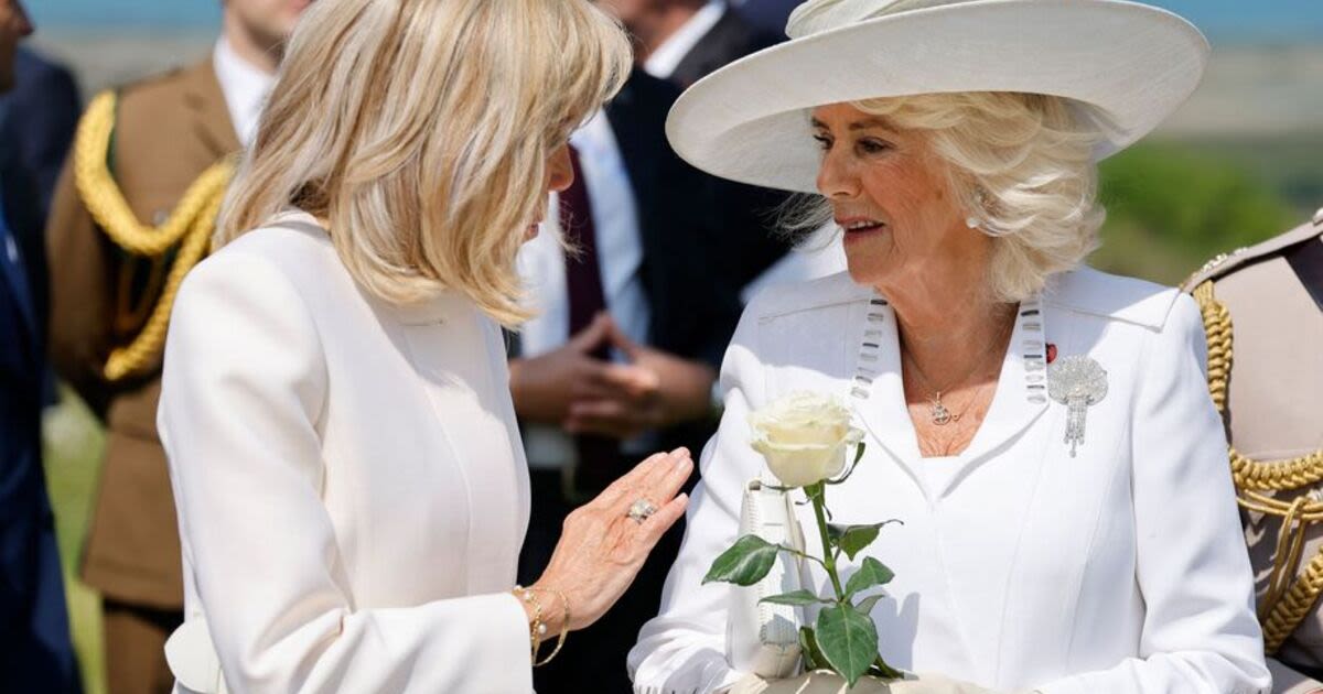 Brigitte Macron red-faced as she tries to hold Camilla's hand at D-Day memorial
