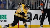 Bruins improve to team-record 9-0 at home, beat Canucks