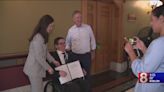 Wheelchair repair bill celebrated during signing ceremony