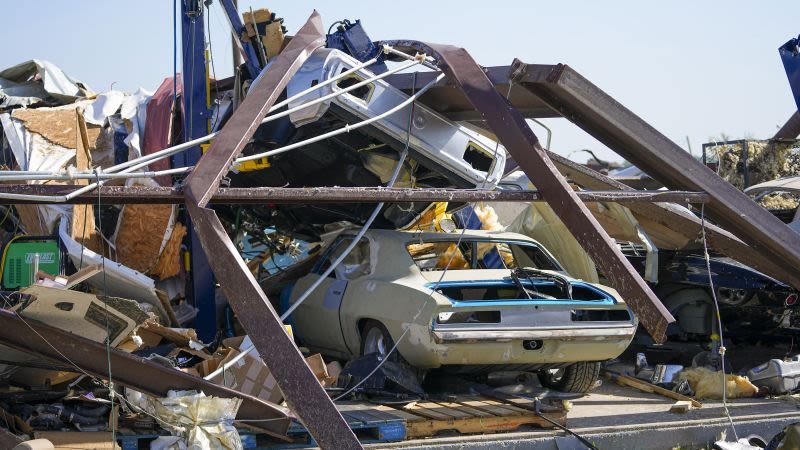 At least 18 people are dead after tornado-spawning storms strike the central US on Memorial Day weekend