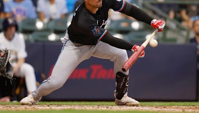 Bell s 3-run homer in 7th inning helps lift Marlins past Brewers 7-3