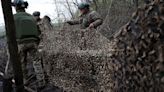 Saab debuts camo net that lets soldiers’ radio signals pass through