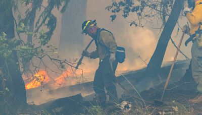 California firefighters make progress amid blaze devastation