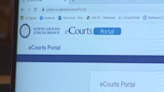 NC clerks dropped from wrongful detention lawsuit, court software company still blamed