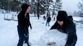 Snow hits high country as Phoenix doused with rain