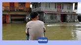 Man holds pregnant wife afloat for three hours during floods in China, video of rescue goes viral