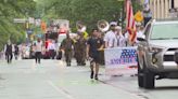 Local communities honor fallen heroes with parades and remembrance ceremonies