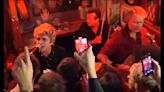 "We are Green Day, and this one's called Welcome To Paradise": Watch Green Day play a surprise secret acoustic show in a London pub