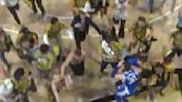 Watch: Duke Basketball Star Injured by Fans Storming Court