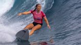 American Carissa Moore began defense of her Olympic surfing title, wins first heat