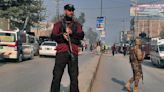 A roadside bombing in the commercial center of Pakistan's Peshawar city wounds at least 3 people