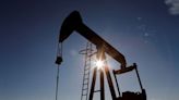 Oil prices dive on big US crude stock build, record output