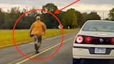 Mystery Man Goes Full 'Forrest Gump' Running Away From Police