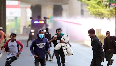 Police hurl tear gas at protesters in Nairobi as Kenya Cabinet sworn in