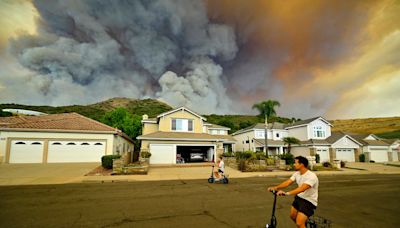 5,500-acre ‘Airport Fire’ in Orange County seen in photographs