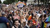 Tens of thousands rally against transphobia at Paris Pride March