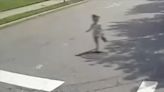 Dashcam shows four-year-old wandering into busy intersection