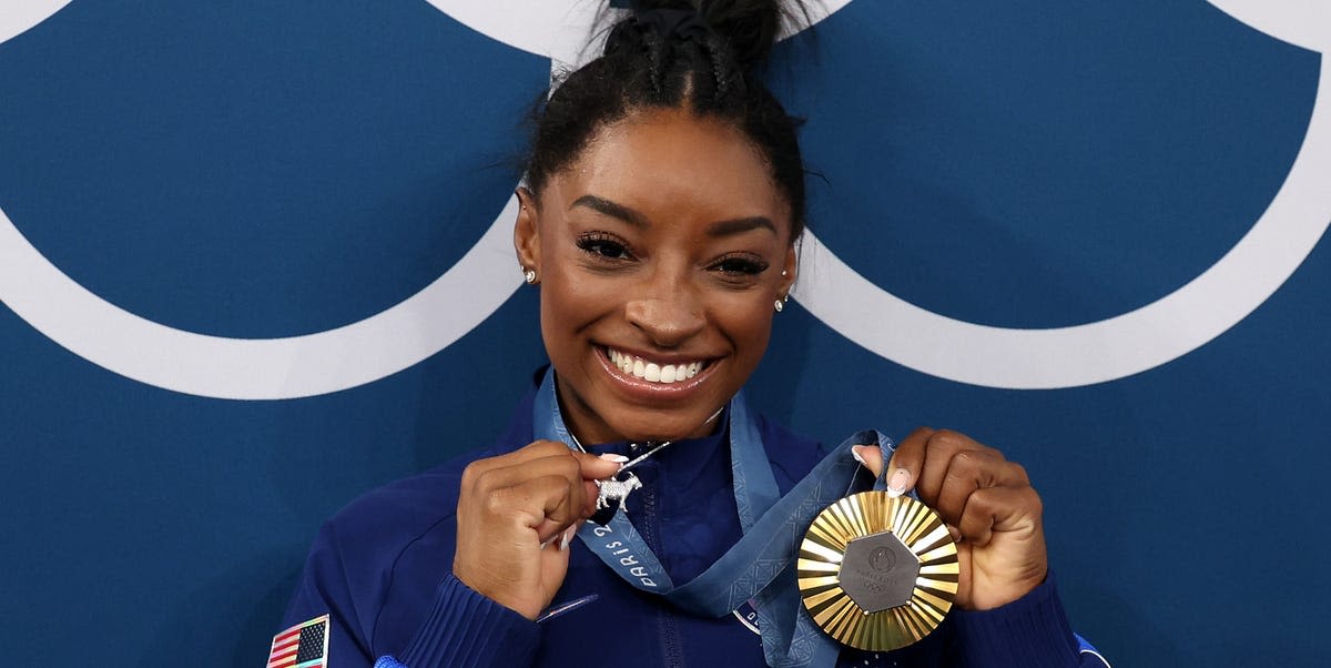 The Meaning Behind Simone Biles’s Sparkly Goat Necklace Is Iconic