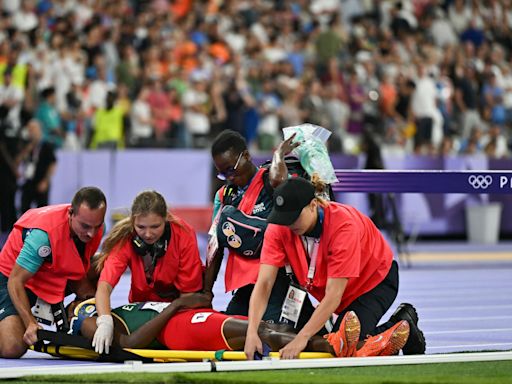 World record holder leaves Olympic track on stretcher after terrifying fall