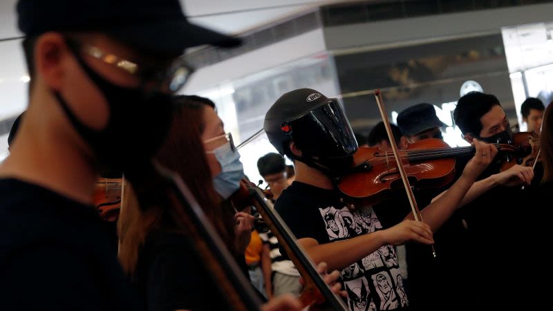 YouTube blocks videos of Hong Kong protest song after local court order | CNN Business