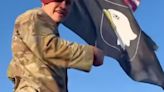 82nd Airborne paratroopers cut down a 101st flag from an iconic bar on D-Day