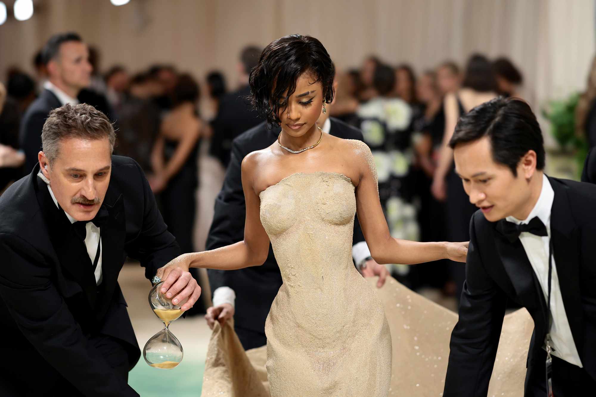 Tyla Gets Lifted Up the 2024 Met Gala Steps in Her Form-Fitting Sand Dress