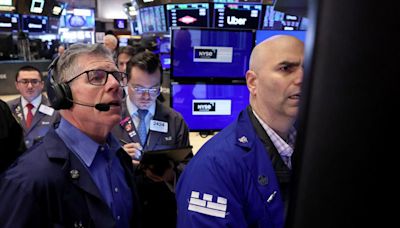 Wall Street stocks close flat; jobs data strong but rates still high