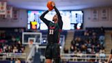 Howard basketball players shoot hoops while studying for a Ph.D. and law degree