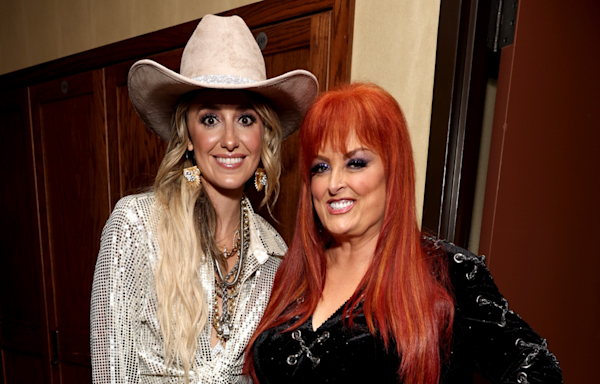 Watch Lainey Wilson Surprise Her Dad With Wynonna Judd On FaceTime: 'Wynonna Is The Real Deal Y’all' | iHeartCountry Radio