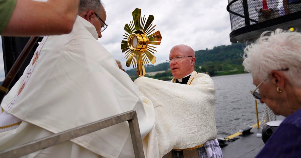 On heartland roads, and a riverboat, devout Catholics press on with two-month nationwide pilgrimage