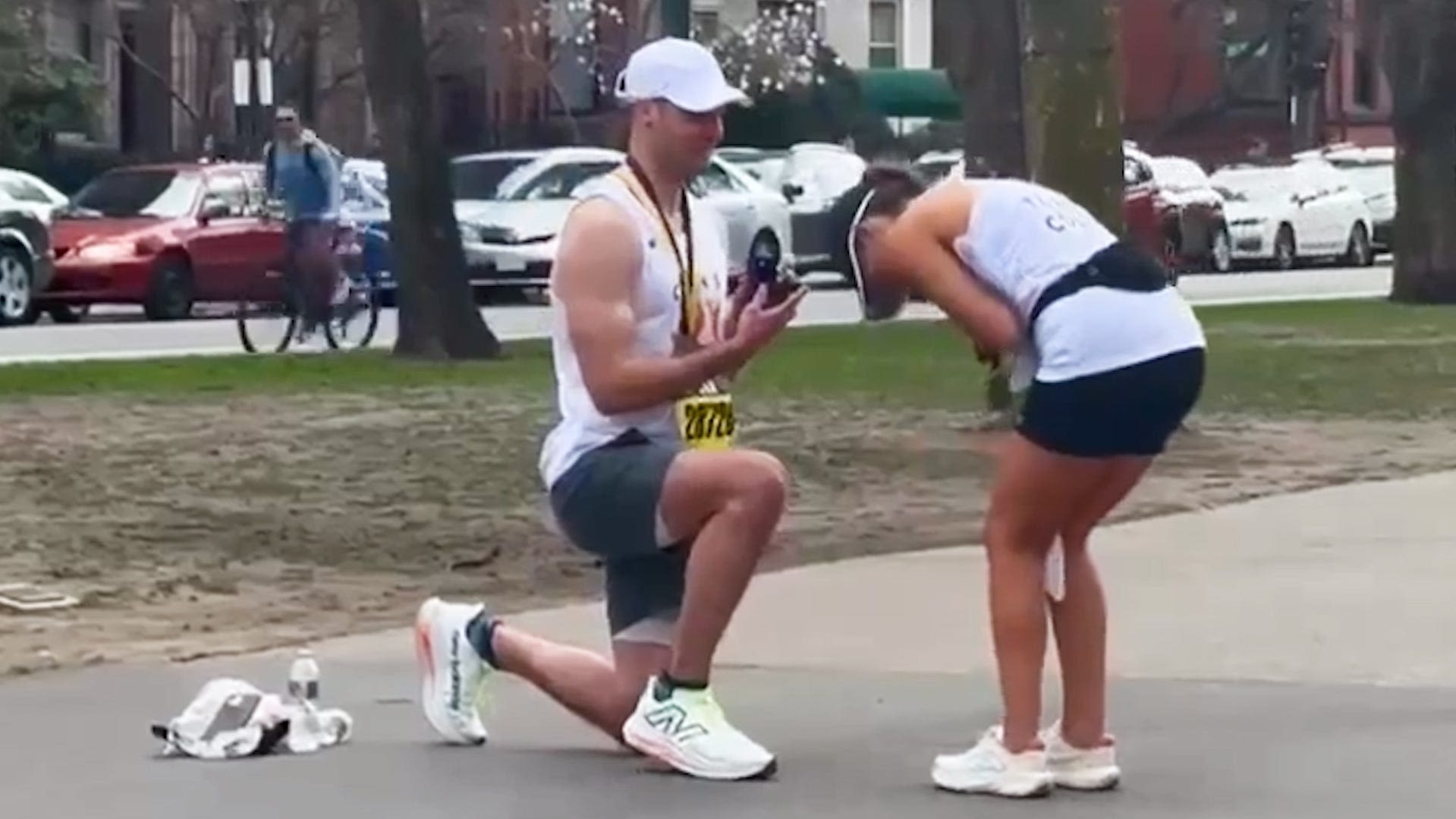 Watch Boston Marathon runner propose to girlfriend after she crosses the finish line