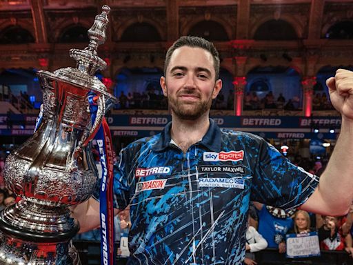 World Matchplay Darts: Luke Humphries joins the greats after beating Michael van Gerwen to claim title in Blackpool