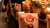 Pakistan investigating the shooting death of a suspect in the 2013 killing of an accused Indian spy