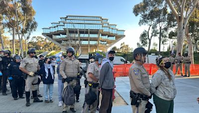 Police descend on protest encampment at UCSD and arrest dozens