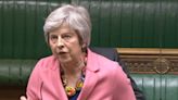 Theresa May says small boats bill ‘shuts door’ to trafficking victims as Tory backlash builds