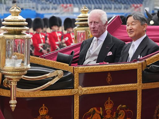 Japanese emperor reconnects with the River Thames in state visit meant to bolster ties with UK