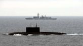 Royal Navy warships shadow Russian submarine in the Channel as four Kremlin vessels enter UK waters