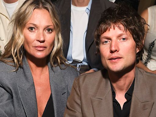 Kate Moss breaks her usual front row poise at Dior show in Paris