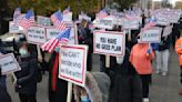 Hundreds march in Chicago's Brighton Park to protest tent encampment for migrants